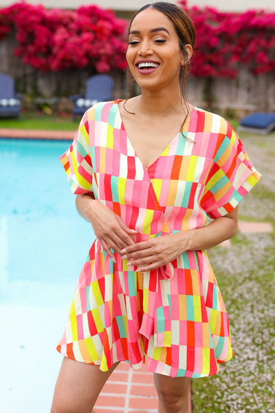 Eyes On You Coral Geo Abstract Surplice Woven Romper
